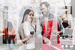 Man And Woman Outside Barbecue Wine Drinking.