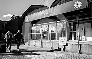 Man and woman passing by Police station in Hamburg