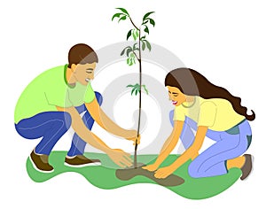 man and woman are planting tree. The couple plants seedling. girl helps man plant young tree.