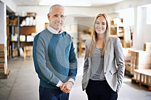 Man, woman and portrait of business people in factory with confidence, logistics or distribution. Partnership, shipping