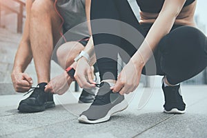 Man and woman preparing for training