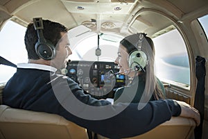 Man and woman in private plane
