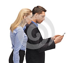 Man and woman reading sms