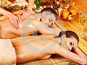 Man and woman relaxing in spa.