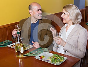 man and woman in restaurant