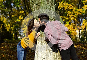 Man and woman with romantic faces on nature background