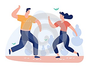 Man and woman running together outdoors. Both are dressed in casual sportswear and look active. Fitness exercise and