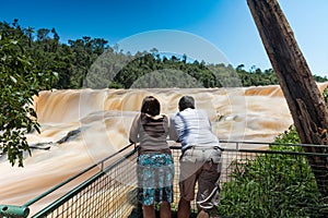 Man and woman on the Saltos del Monday in Paraguay. photo