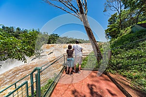 Man and woman on the Saltos del Monday in Paraguay. photo