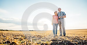 Man and woman, a senior couple, embracing each other