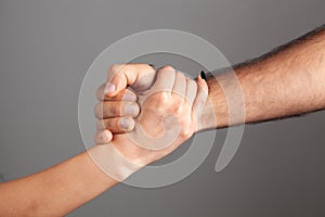 man and woman shake hands