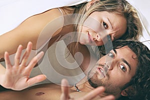 Man and woman with shocked expression