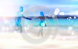 Man And Woman Silhouette On Seaside Hold Hands Walking To Beach Blurred Bokeh Effect Beautiful Glowing Background