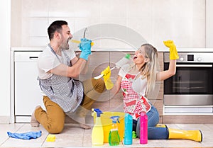 Man and woman singing after finishing chores