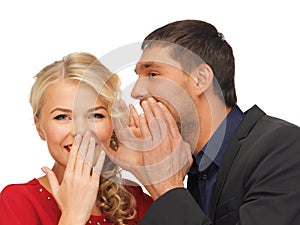 Man and woman spreading gossip