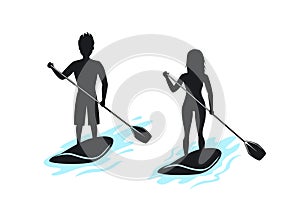 Man and woman stand up paddling photo