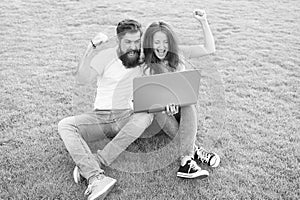 Man and woman surfing internet on notebook. students life. online shopping. communication online. happy couple use