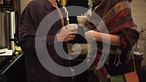 Man and woman talking in a restaurant