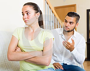 Man and woman talking stressfully