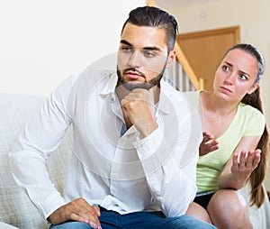 Man and woman talking stressfully