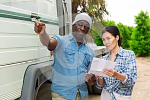 Man and woman are talking about trucking