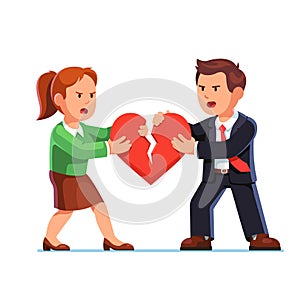 Man and woman tearing red heart in halves