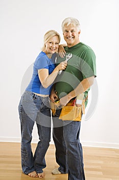 Man and woman with tools.