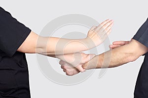 Man and woman are training techniques of Wing Chun Kung Fu