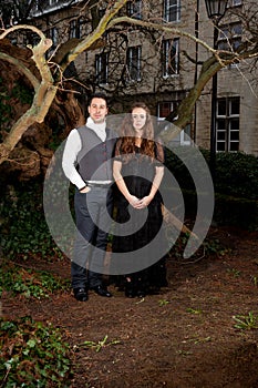 Man and woman in Victorian clothing in the park