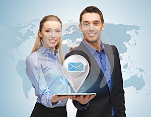 Man and woman with virtual email sign