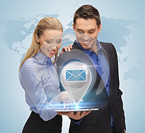 Man and woman with virtual email sign