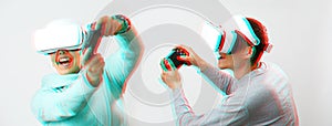 Man and woman with virtual reality headset are playing game. Image with glitch effect.