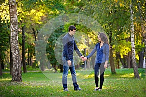 Man and woman walking in the park