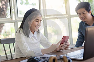 Man and woman workers talking in coffee shop