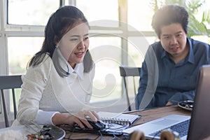 Man and woman workers talking in coffee shop