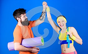 Man and woman with yoga mat and sport equipment. Fitness exercises. Workout and fitness. Girl and guy live healthy life