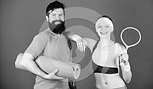 Man and woman with yoga mat and sport equipment. Girl and guy live healthy life. Fitness class. Keeping those muscles