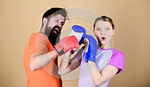 Man and woman in boxing gloves. Boxing sport concept. Couple girl and hipster practicing boxing. Sport for everyone