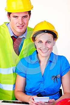 Man and women with hard hat