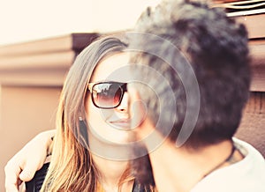 Man and woman with smiling face have date at cafe.