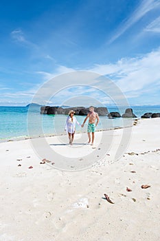 Man and women on a tropical beach in Thailand, Koh Kham Thailand Trat