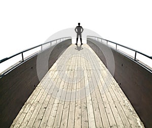 Man on a wooden bridge