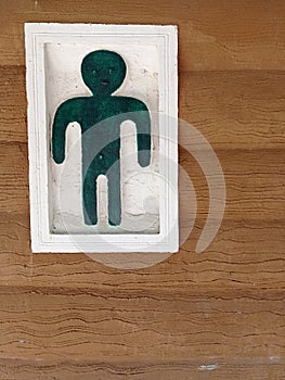 Man wooden vintage sign on the wooden wall for toilet