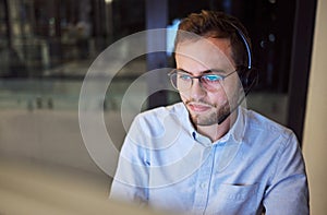 Man, work and crm with reflection on glasses in office for telemarketing with computer at business. Businessman, working