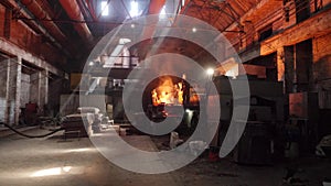 Man work with fire on factory