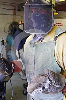 Man at work in the Foundry wearing protective gear