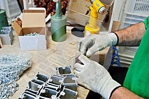 Man worker hold screwdriver machine and use it