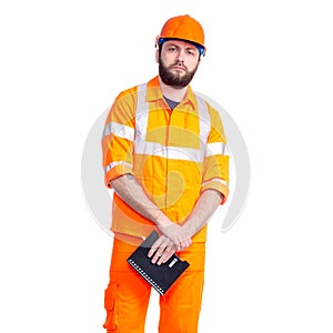 Man worker road constructor looking, notebook and pen in hand