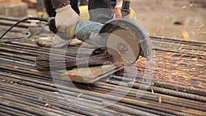 A man working with angle grinder