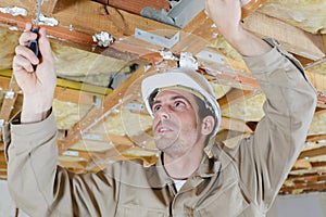 man working as builder